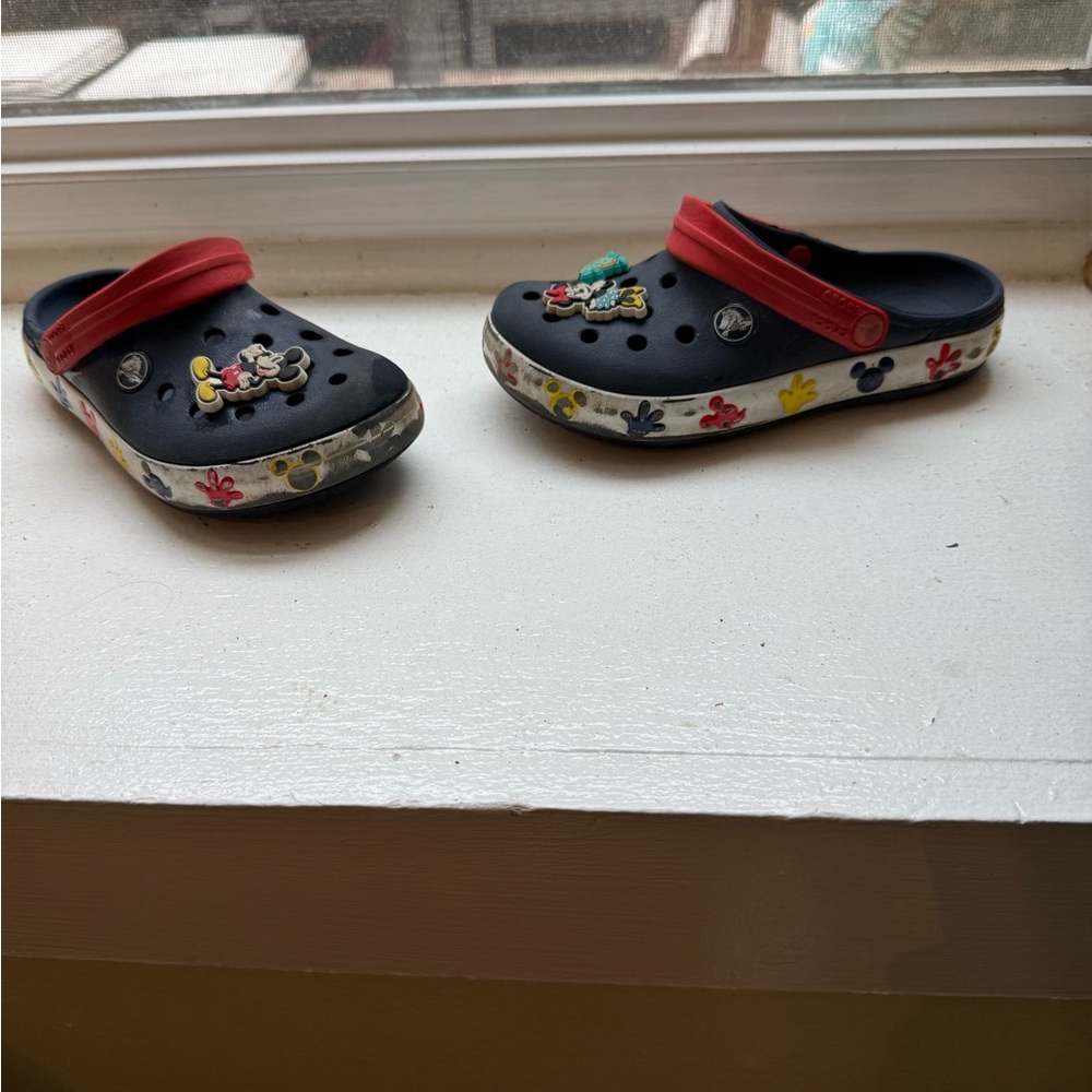 Navy and red Disney crocs